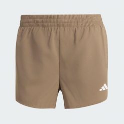 Szorty do ćwiczeń Essentials 2in1. Białe szorty sportowe damskie Adidas, l, bez wzorów, z elastanu, eleganckie, z standardowym stanem, na fitness i siłownię, climacool (adidas). Za 179.00 zł.