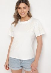 Biały T-shirt z Kwiatowymi Aplikacjami Tilenna. Białe bluzki damskie Born2be, l, z aplikacjami, z jeansu, eleganckie, bez kołnierzyka. Za 69.99 zł.