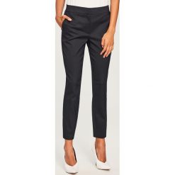 Eleganckie spodnie - Granatowy. Niebieskie spodnie materiałowe damskie Reserved. Za 119.99 zł.