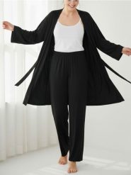 Spodnie piżamowe z szeroką nogawką - czarny. Czarne piżamy damskie Sinsay, l, bez wzorów, bez ramiączek. Za 29.99 zł.