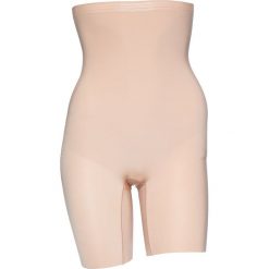 Spodnie modelujące w kolorze jasnoróżowym. Czerwone spodnie materiałowe damskie marki DKNY, bez wzorów. W wyprzedaży za 98.95 zł.