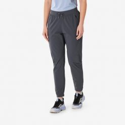 Spodnie turystyczne damskie Quechua MH500 Light. Fioletowe spodnie sportowe damskie QUECHUA, l, bez wzorów, z elastanu, trekkingowe. W wyprzedaży za 99.99 zł.