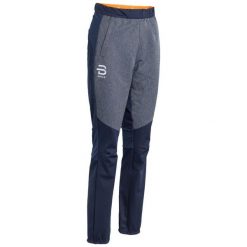 Spodnie narciarskie dla kobiet Daehlie Sportswear Field. Niebieskie spodnie materiałowe damskie DAEHLIE, na zimę, bez wzorów, sportowe, narciarskie. Za 709.50 zł.