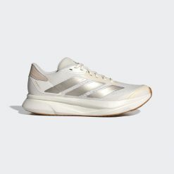 Buty Duramo SL 2 Running. Białe obuwie sportowe damskie Adidas, bez wzorów, z materiału, do biegania. Za 261.00 zł.