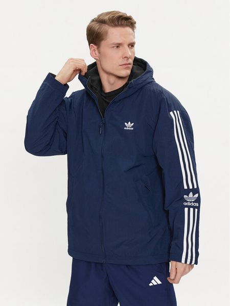 Adidas Kurtka przejściowa Reversible Polar Fleece HL9188 Granatowy Regular Fit. Niebieskie kurtki męskie Adidas, l, bez wzorów, z polaru, sportowe, bez kaptura. Za 329.99 zł.