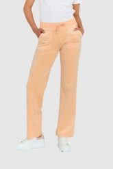 JUICY COUTURE Klasyczne welurowe spodnie dresowe del ray w brzoskwiniowym kolorze. Brązowe spodnie dresowe damskie Juicy Couture, s, bez wzorów, z dresówki. W wyprzedaży za 299.99 zł.