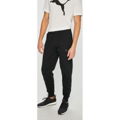 Puma - Spodnie. Szare spodnie sportowe męskie Puma, z bawełny. W wyprzedaży za 159.90 zł.