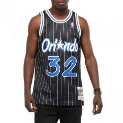 Koszulka do koszykówki męska Mitchell & Ness Orlando Magic NBA Swingman Jersey. Czarne koszulki sportowe męskie Mitchell & Ness, l, bez wzorów, z jersey, bez kołnierzyka, bez ramiączek, do koszykówki. Za 466.50 zł.