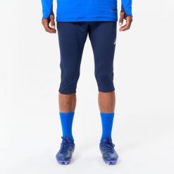Spodnie piłkarskie 3/4 Kipsta CLR. Niebieskie spodnie sportowe męskie KIPSTA, xl, bez wzorów, z elastanu, na fitness i siłownię. Za 89.99 zł.