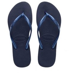 Klapki Havaianas Model 4000030 Kolor Niebieski. Niebieskie klapki damskie Havaianas, bez wzorów, z gumy, bez obcasa. Za 130.45 zł.