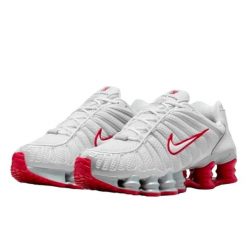 Buty do chodzenia dla dorosłych Nike Shox TL Gym Red. Czerwone obuwie sportowe damskie Nike, bez wzorów, z materiału, trekkingowe. Za 1,181.96 zł.