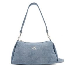 Torebka Calvin Klein. Niebieskie torebki do ręki damskie Calvin Klein, bez wzorów, z denimu, klasyczne, bez dodatków. Za 259.99 zł.