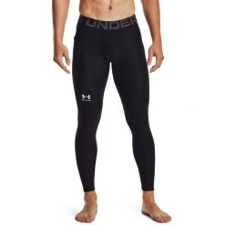 Legginsy męskie Under Armour HeatGear®. Czarne legginsy sportowe męskie Under Armour, m, bez wzorów, z materiału, na jogę i pilates. Za 129.99 zł.