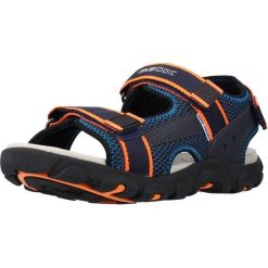 Sandały GEOX JR SANDAL STRADA A Niebieski. Niebieskie sandały męskie Geox, ze skóry, bez zapięcia. Za 141.99 zł.