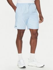 Lacoste Szorty tenisowe GH353T Błękitny Regular Fit. Niebieskie krótkie spodenki sportowe męskie Lacoste, m, bez wzorów, z syntetyku, tenisowe. Za 189.99 zł.