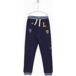 Lemon Explore - Spodnie dziecięce 122-164 cm. Spodnie sportowe dla chłopców marki LEMON explore. W wyprzedaży za 59.90 zł.