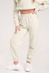 Spodnie fitness damskie Gym Glamour dresowe off. Białe spodnie dresowe damskie GYM GLAMOUR, l, bez wzorów, z bawełny, na fitness i siłownię. Za 189.99 zł.