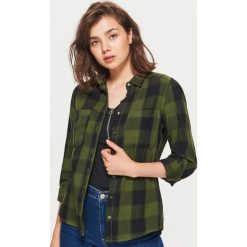 Koszula w kratę - Khaki. Koszule damskie marki SOLOGNAC. W wyprzedaży za 29.99 zł.