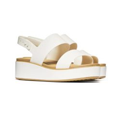Damskie sandały Crocs BROOKLYN MATTE WRAP LOW WEDGE W 211802-00O 4. Białe sandały damskie Crocs, bez wzorów, z materiału, bez obcasa, na koturnie, bez zapięcia. Za 204.42 zł.