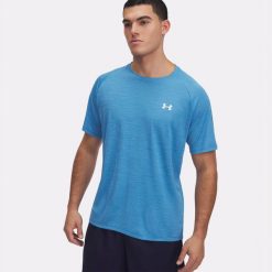 Koszulka szybkoschnąca męska Under Armour Tech Textured SS. Niebieskie buty sportowe męskie Under Armour, bez zapięcia, na fitness i siłownię. Za 139.99 zł.
