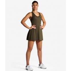 Sukienka tenisowa damska elegancka. Zielone sukienki damskie NORDICDOTS, xs, bez wzorów, z materiału, eleganckie, bez kołnierzyka, bez ramiączek, sportowe. Za 405.00 zł.
