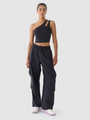 4F Spodnie oversize cargo damskie 4F x Anna Lewandowska - czarne S. Czarne spodnie sportowe damskie 4f, l, bez wzorów, z bawełny. W wyprzedaży za 119.99 zł.