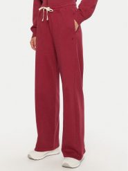 Champion Spodnie dresowe 117638 Czerwony Wide Leg. Czerwone spodnie dresowe damskie Champion, xs, bez wzorów, z bawełny. Za 159.99 zł.