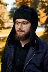 Zimowa czapka uszatka z polarem Brødrene cz3 czarna 9914. Czarne czapki i kapelusze męskie na zimę, bez wzorów, z polaru. Za 98.00 zł.