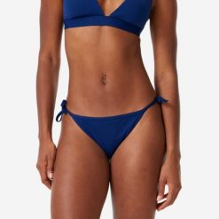 Dół kostiumu kąpielowego damski Decathlon Sandy Zuma. Niebieskie bikini damskie OLAIAN, bez wzorów. Za 39.99 zł.