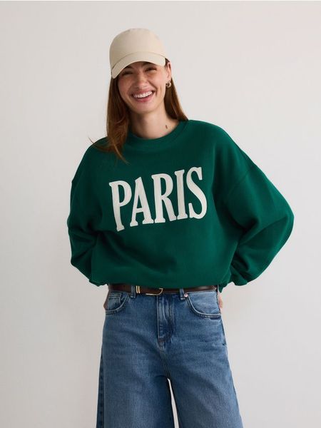 Bluza oversize z nadrukiem - zielony. Zielone bluzy damskie Reserved, l, bez wzorów, z bawełny, bez kaptura. W wyprzedaży za 69.99 zł.