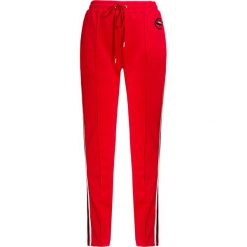 Spodnie MARKUS LUPFER KIMMY SEQUIN LIP. Czerwone spodnie dresowe damskie Markus Lupfer, z aplikacjami, z tkaniny. W wyprzedaży za 642.00 zł.