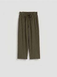 Spodnie z wiskozą - zielony. Zielone spodnie materiałowe damskie Reserved, l, bez wzorów, z tkaniny. Za 99.99 zł.