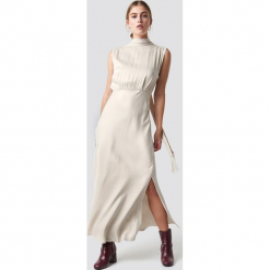 MANGO Sukienka Cava - Beige,Nude,Offwhite. Brązowe sukienki damskie Mango, z materiału, z dekoltem na plecach. Za 404.95 zł.