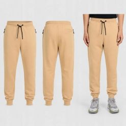SPODNIE MĘSKIE DRESOWE 4F JOGGERY SPORTOWE BEŻOWE. Brązowe spodnie sportowe męskie 4f, m, bez wzorów, z bawełny, na fitness i siłownię. Za 149.99 zł.