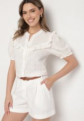 Biała Koszula z Wiskozą z Haftowanej Tkaniny Ozdobiona Falbanką Rindelia. Białe bluzki damskie Born2be, l, bez wzorów, z jeansu, eleganckie, bez kołnierzyka, bez ramiączek. Za 99.99 zł.