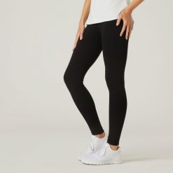 Legginsy fitness damskie Nyamba 100 Salto. Czarne legginsy damskie DOMYOS, plus size, bez wzorów, z bawełny, na fitness i siłownię. Za 29.99 zł.