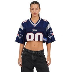 Second life - Koszulka damska NFL New England Patriots 80 - Jak nowy. Niebieskie koszulki sportowe damskie NFL, s, bez wzorów, z materiału, bez kołnierzyka, bez ramiączek, do piłki nożnej. Za 170.36 zł.