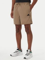 Adidas Szorty sportowe Essentials Small Logo Chelsea KF2400 Beżowy ciemny Regular Fit. Brązowe krótkie spodenki sportowe męskie Adidas, m, bez wzorów, z syntetyku. Za 119.99 zł.
