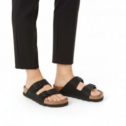 Klapki damskie Rieker, profilowana wkładka anatomiczny kształt regulowane paski solidne klamry korkowa podeszwa stabilne podparcie stopy, czarne, V31. Czarne klapki damskie Rieker, bez wzorów, bez obcasa, bez zapięcia. Za 299.00 zł.