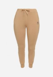 Beżowe Klasyczne Spodnie Dresowe o Kroju Joggerów Lerive. Brązowe spodnie dresowe damskie Born2be, xl, bez wzorów, z dresówki. Za 44.99 zł.
