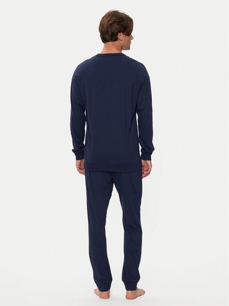 United Colors Of Benetton Piżama 3VD04P02D Granatowy Regular Fit. Niebieskie piżamy męskie United Colors Of Benetton, m, bez wzorów, z bawełny, bez ramiączek. Za 219.99 zł.