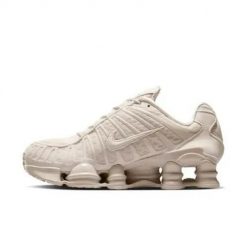 Buty do chodzenia damskie Nike Shox TL. Brązowe obuwie sportowe damskie Nike, bez wzorów, z jeansu, trekkingowe. Za 919.99 zł.