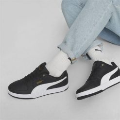 Sneakersy unisex Caven 2.0 PUMA Black White Gold. Białe obuwie sportowe damskie Puma, bez wzorów, trekkingowe. Za 239.00 zł.