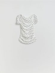 Bluzka w grochy - wielobarwny. Bluzki damskie Reserved, l, bez wzorów, z dzianiny, bez kołnierzyka, bez ramiączek. Za 69.99 zł.