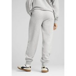 Damskie spodnie dresowe z wysokim stanem i małym logo No.1 ESS Comfort PUMA. Czarne spodnie dresowe damskie Puma, xs, bez wzorów, z dresówki. W wyprzedaży za 159.00 zł.