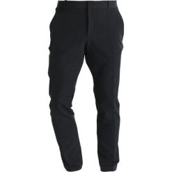 Nike Performance FLEX PANT Spodnie materiałowe black. Spodnie materiałowe męskie Nike Performance, z elastanu, sportowe. Za 399.00 zł.