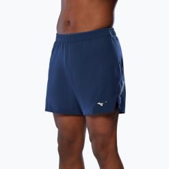 Spodenki do biegania męskie Mizuno Alpha 5.5". Niebieskie krótkie spodenki sportowe męskie Mizuno, m, bez wzorów, z elastanu, do biegania. Za 139.99 zł.