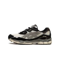 Buty do chodzenia dla dorosłych ASICS Gel-NYC Ivory Clay Grey. Czarne obuwie sportowe damskie Asics, bez wzorów, ze skóry, trekkingowe. Za 1,404.20 zł.