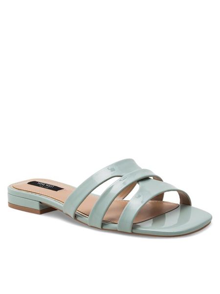 Nine West Klapki 123AL1207-1 Niebieski. Niebieskie klapki damskie Nine West, bez wzorów, ze skóry, bez obcasa. Za 107.99 zł.