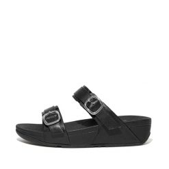 Kobiece klapki na koturnie FitFlop Lulu. Czarne klapki damskie FIT FLOP, bez wzorów, eleganckie, bez obcasa, na koturnie. Za 565.50 zł.